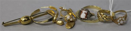 An 18ct gold ring, a 9ct gold and white opal ring, two other rings, two pairs of earrings and a brooch